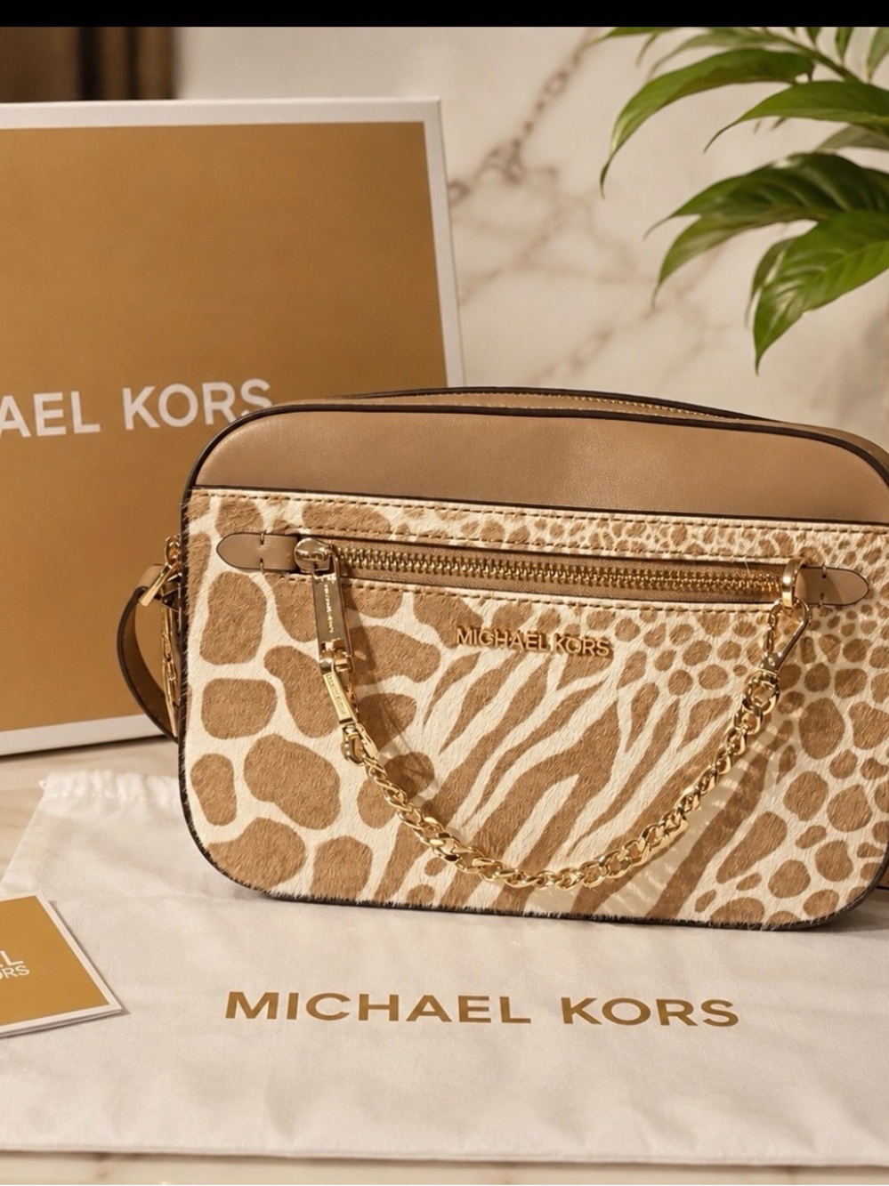 Michael Kors  calf hair Animal Print Crossbody bag
Retail 498